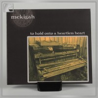 MEKIGAH "To Hold Onto A Heartless Heart" digipack cd